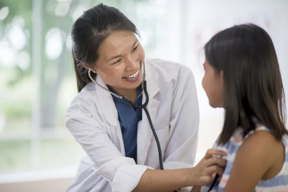 A pediatrician and her patient