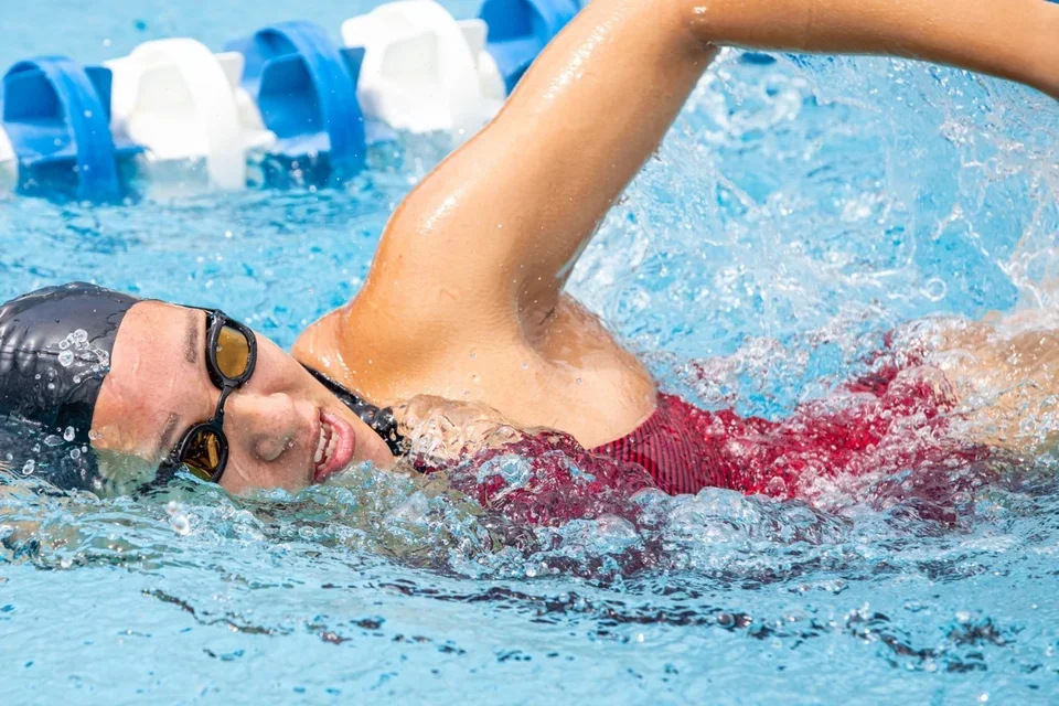 Medical student and swimmer Yifan Mao during a swim meet 