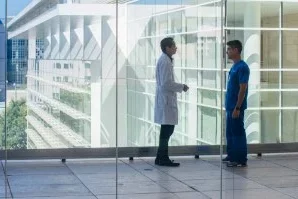 DGSOM resident talking to a faculty mentor