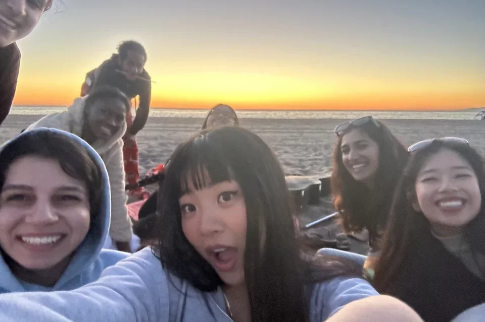 Medical student Joy Xu, pictured here with classmates at the beach, shares her story of becoming a doctor. 