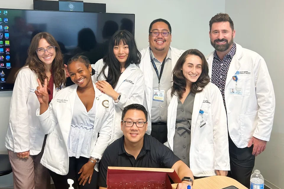 Medical student Joy Xu, pictured here with colleagues, shares her story of becoming a doctor. 