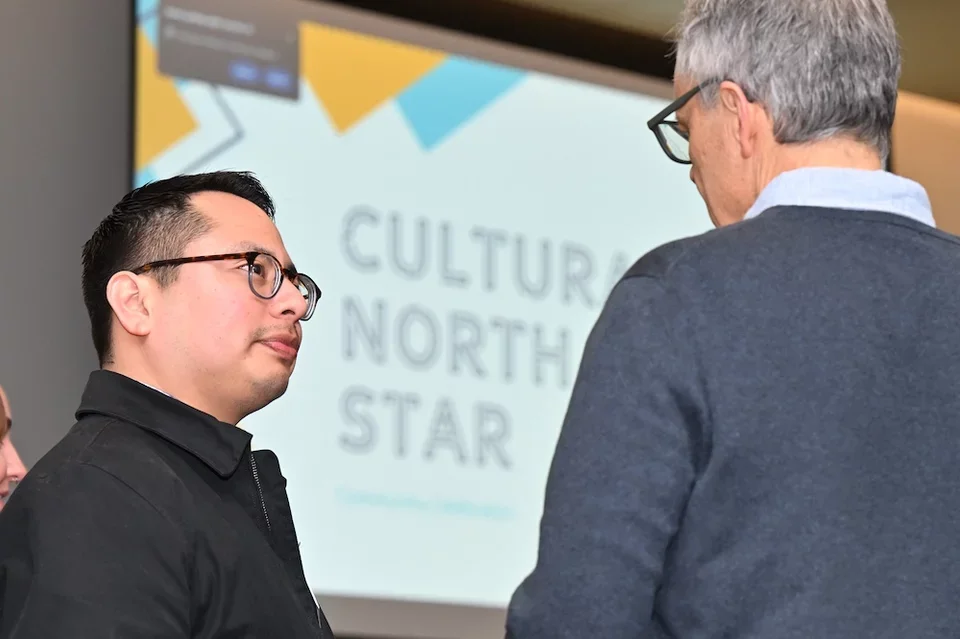 two coworkers speaking