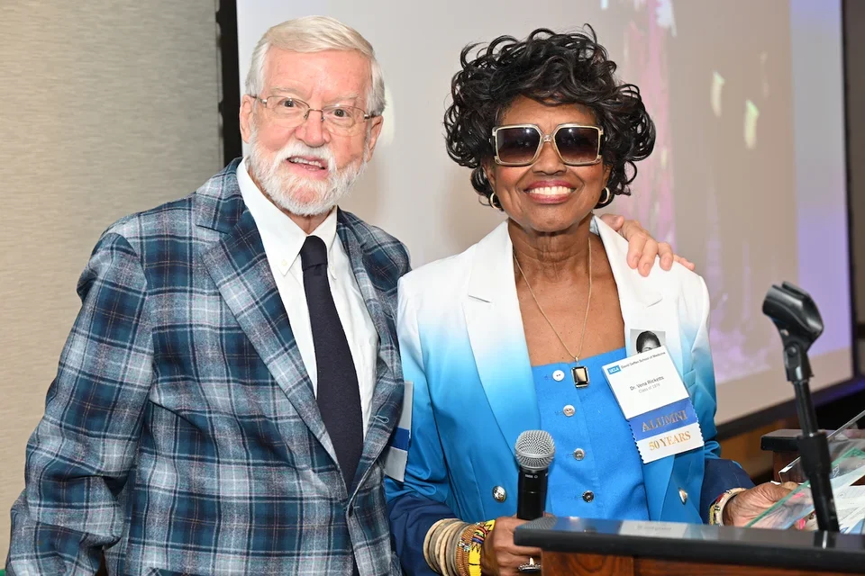 Honoree and co-chair of the class reunion committee, Vena Ricketts, MD, stands with her fellow co-chair Steven Jobst, MD, at their class reunion. 