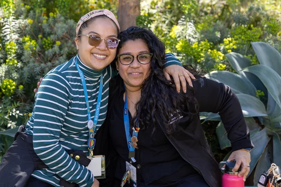 two coworkers smiling