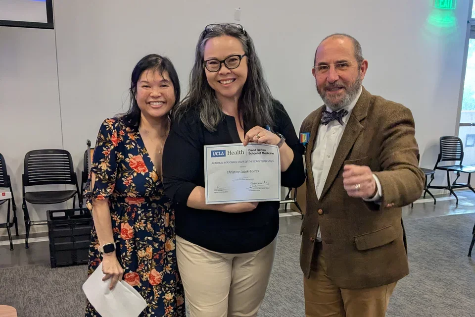 Arlene Feliciano, Christine Lazok-Torres, and Joaquín (Quim) Madrenas, MD, PhD, at award ceremony