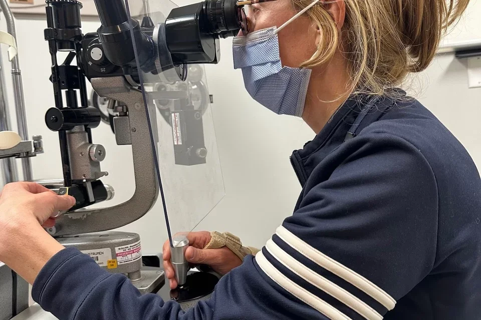 Ophthalmologist Dr. Jo Ann Giaconi using lab equipment