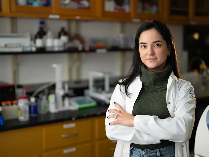 Bioscience PhD Programs UCLA Graduate Student in Lab Coat in the JCCC Stoyanova Research Lab
