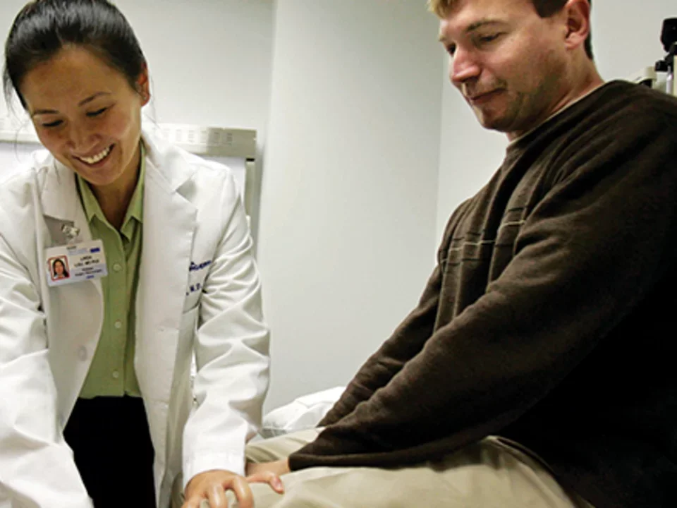 Linda Liau, M.D., Ph.D. with a patient