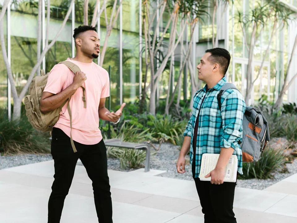 2 students speaking 