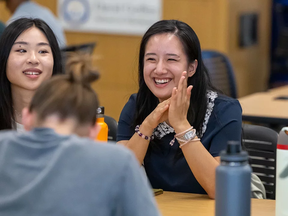 Student Laughing with Others