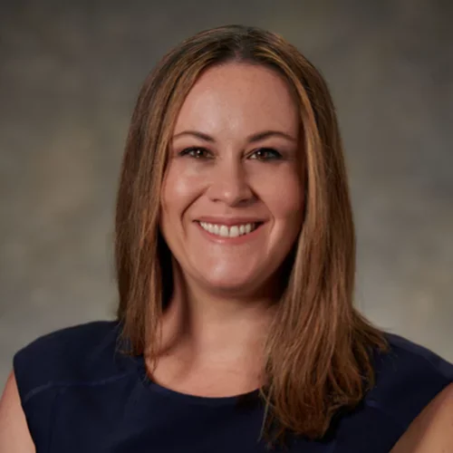headshot of Dr. Amy Cummings in a black dress