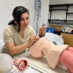 Liliana Perez, pictured with a medical model, shares why she's becoming a doctor