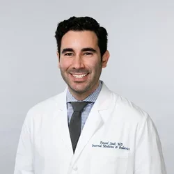 Headshot of Faysal Saab, MD, DTMH, FACP