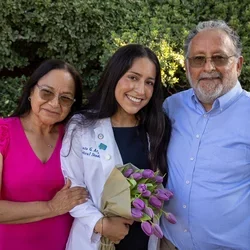Urania Argueta with her parents