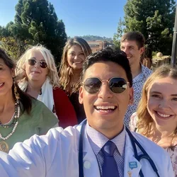 DGSOM medical student Jose Segura-Bermudez posing with friends and family