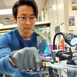 Justin Pi, pictured here working in a lab setting, shares his experience of getting a PhD at UCLA