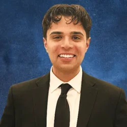 Headshot of Rayan Baig, executive clerkship coordinator for Family Medicine