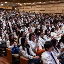 First-year medical students received their white coats during a ceremony Sept. 6 at UCLA's Royce Hall.