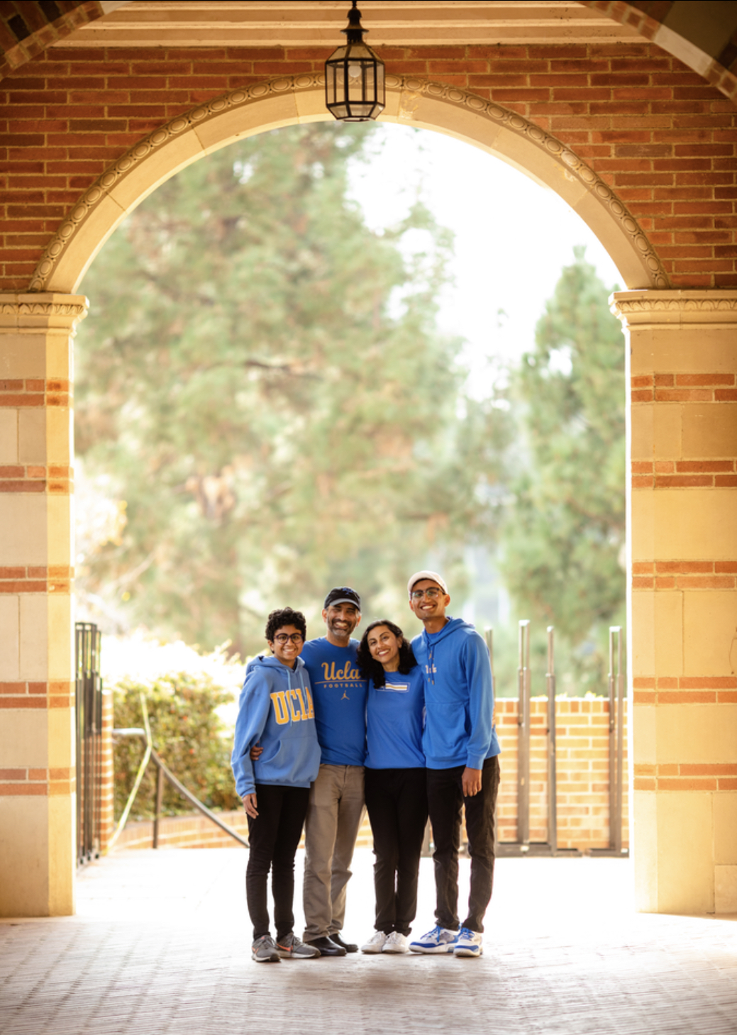 The Agarwal family poses in a UCLA academic building