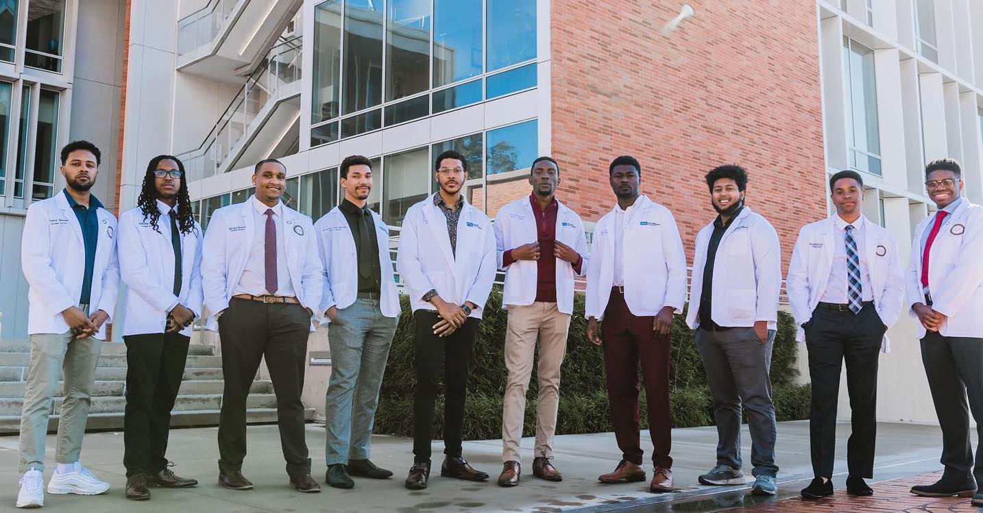 Becoming a Doctor: Tristan Paul Bennett posing with his classmates