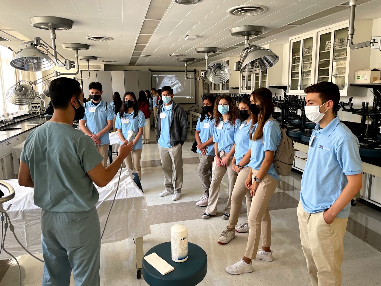 Students from the UCLA Pre-Med Summer Scholars Program gather to see a demonstration. 