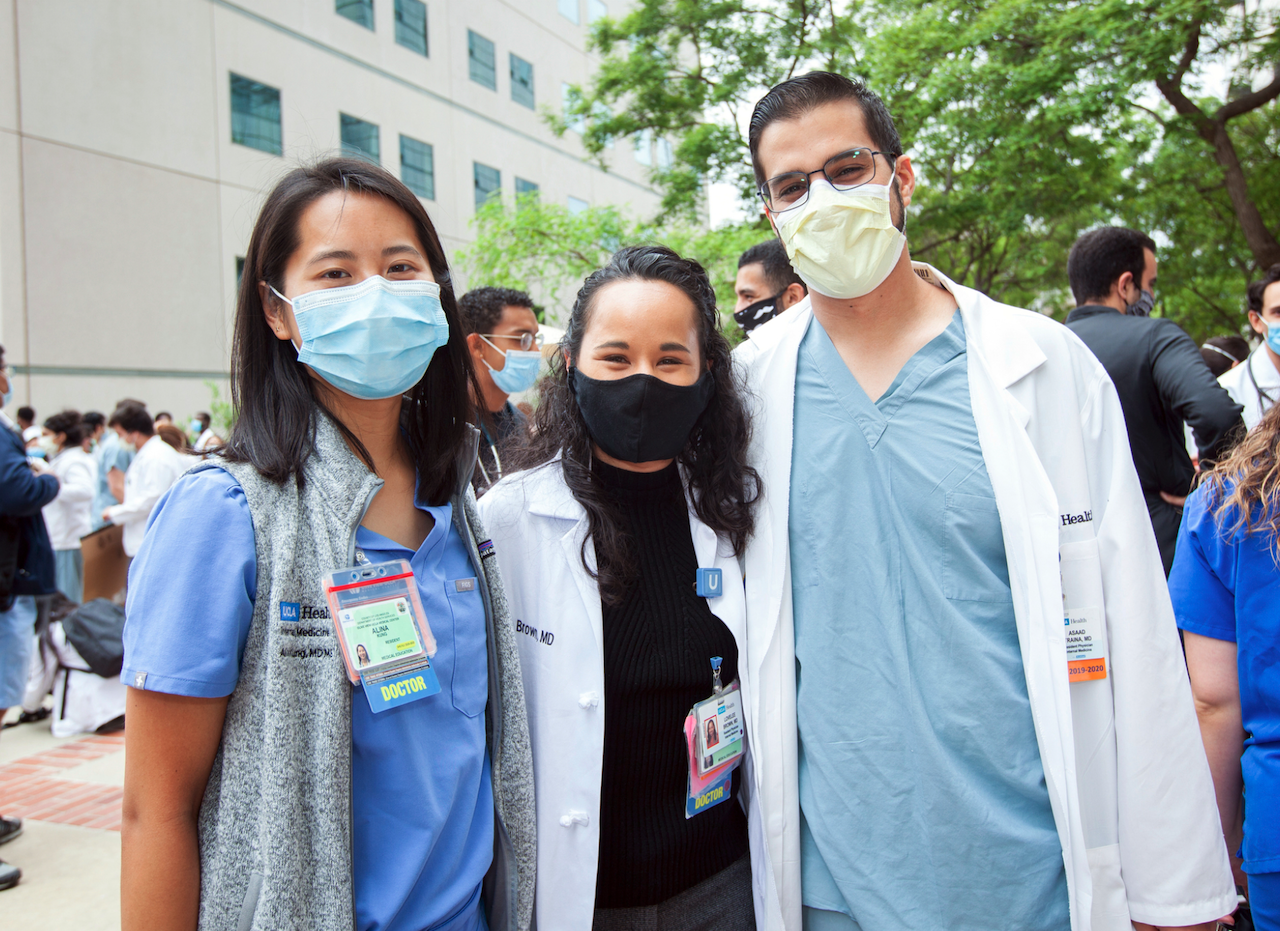 Three doctors pictured at a UCLA Health day of solidarity with the BLM movement