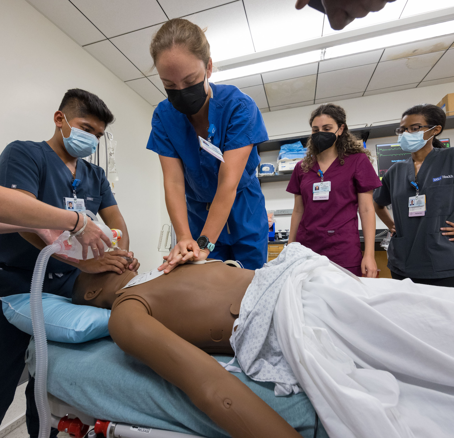 Students working in a simulation center
