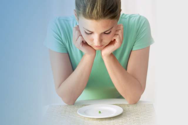 What Causes Eating Disorders? Female Conflicted About Eating Single Pea