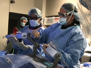 What Is a Cardiologist? Dr. Marcella Calfon Press working in the catheter lab
