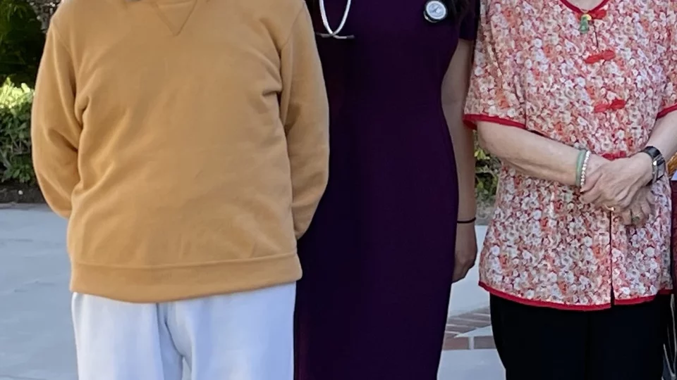 Ayesha Ng, pictured with her grandparents, shares her story of becoming a doctor