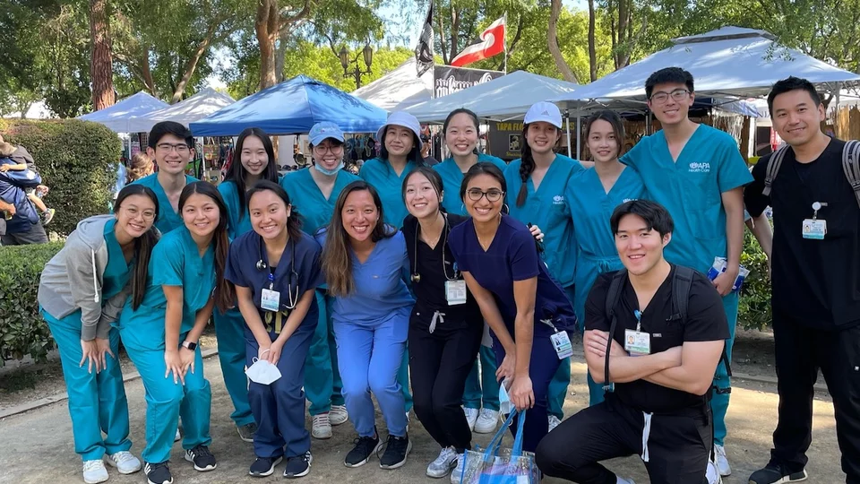 Ayesha Ng, pictured with a group of students and colleagues, shares her story of becoming a doctor