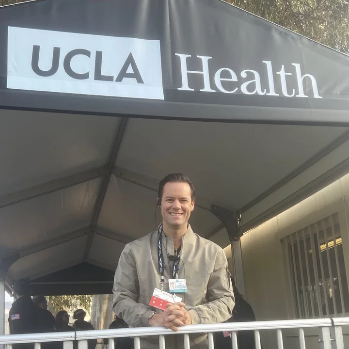 UCLA Surgical Oncologist Dr. Brian Kadera, pictured standing under UCLA Health signage
