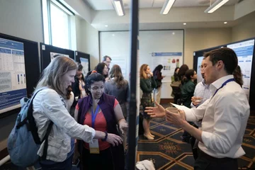 Trainees participating in OCTE poster session