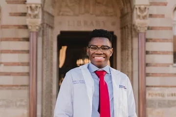 Medical students Myles Anderson, pictured in front of the UCLA library, shares why he's becoming a doctor