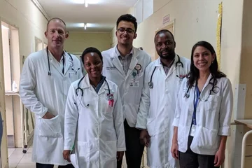 Dr. Chris Buck with UCLA medical students and Mozambican residents
