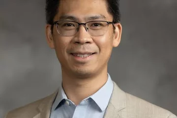 Dr. Kin Fai Au