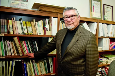 Dr. David Hayes Bautista by bookcase