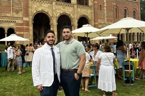 Becoming a Doctor: Gustavo Castellanos and his brother at the White Coat Ceremony