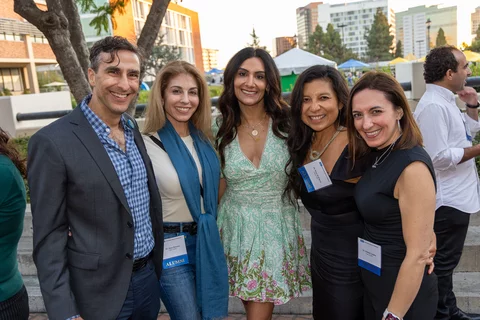 photo of medical school alumni posing together