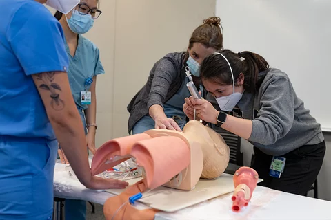 Final-Year Medical Student A medical student is inserting a tracheal tube in a simulation environment