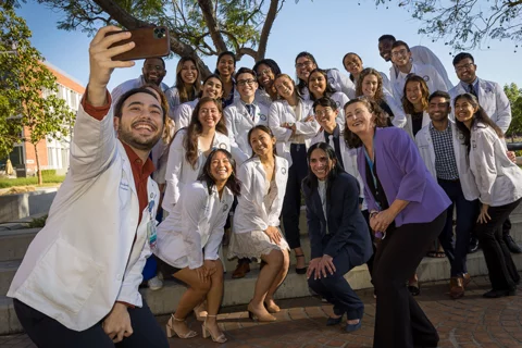 How Friendships Enhance Medical Careers Students and mentors pose for a selfie at the Gold Humanism Honor Society