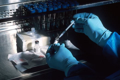 A lab technician working on a blood test