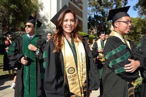 Female graduate in gown 