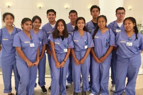 student interns hanging in a group