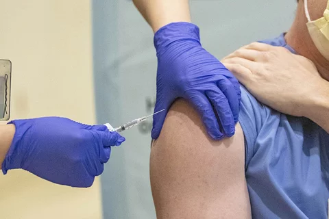 Person receiving vaccine