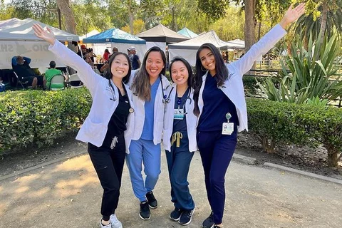 Yifan Mao posing with her med-school friends