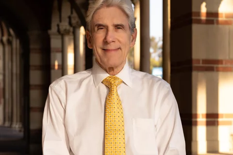 Chancellor Julio Frenk in hallway