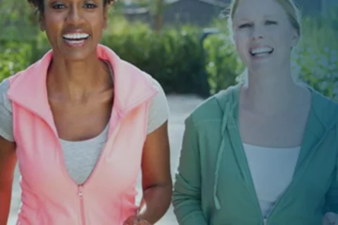 Two people jogging together