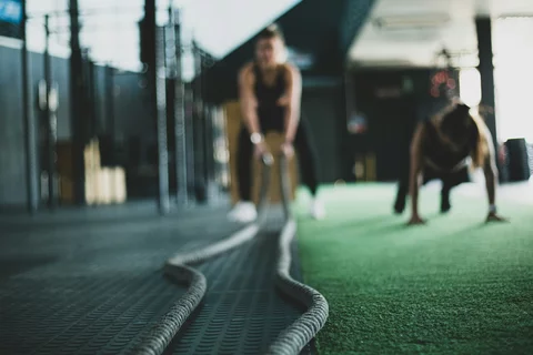 image of two women working out in a gym