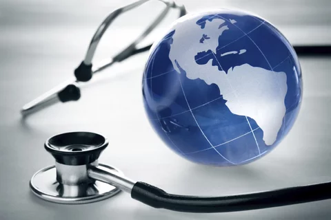 image of a stethoscope and a globe